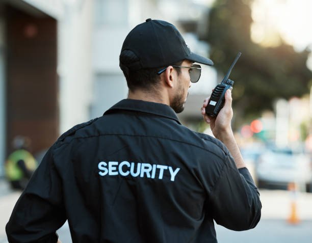 Corporate security officer protecting a business facility